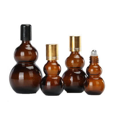 Bottiglie a rullo per oli essenziali a forma di doppia zucca ambrata da 10-100 ml all'ingrosso‌ Eco-compatibili